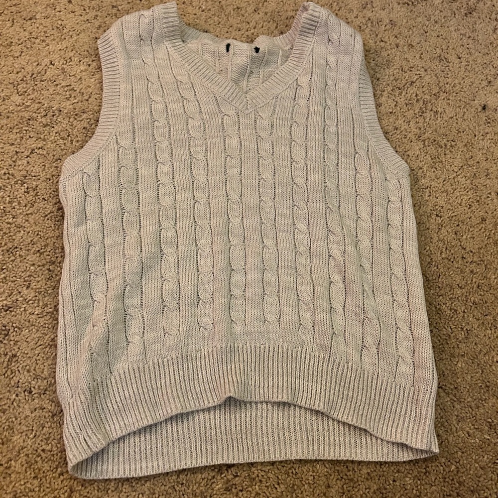 White knitted sweater vest